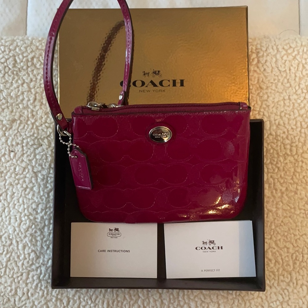 Never used Coach Cranberry wristlet